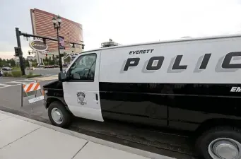  ?? STUART CAHILL / HERALD STAFF ?? POLICING THE PARTY: Everett police vehicles park in the area around Encore Boston Harbor on Aug. 13.