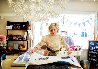  ?? The New York Times/MATT ROTH ?? Nicole Morgenthau, owner of Finch Knitting and Sewing Studio in Leesburg, Va., said a supporter of President Donald Trump threatened a boycott of her shop. She survived the crisis.