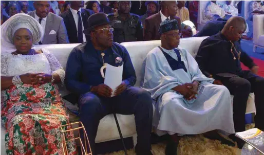  ??  ?? R-L: Eruani, Obasanjo, Dickson and his wife, Rachel, at the foundation laying ceremony of Azikel Refinery in Gbarain, Bayelsa