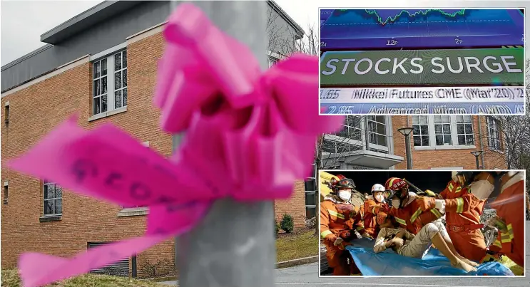  ?? AP ?? Pink ribbons displayed for community support are tied to polls and trees outside the Young Israel synagogue, yesterday in New York. State officials are shuttering schools and houses of worship for two weeks. A television screen on the floor of the New York Stock Exchange, top right, headlines market activity yesterday. A boy pulled from the rubble of a collapsed hotel on a stretcher in Quanzhou, China’s Fujian Province. Several have been killed and others trapped in the collapsed hotel that was being used to isolate people who had arrived from other parts of China hit hard by the coronaviru­s outbreak.