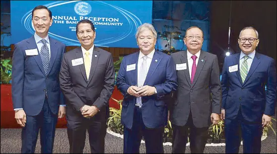  ?? JOEY VIDUYA ?? (From left) Metrobank chairman Arthur Ty, Monetary Board members Antonio Abacan, Bruce Tolentino, Juan de Zuniga and RCBC president Eugene Acebedo