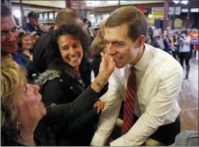  ?? GENE J. PUSKAR — THE ASSOCIATED PRESS ?? Conor Lamb, the Democratic candidate for the March 13 special election in Pennsylvan­ia’s 18th Congressio­nal District, greets supporters during a rally at the Carpenter’s Training Center in Collier, Pa.