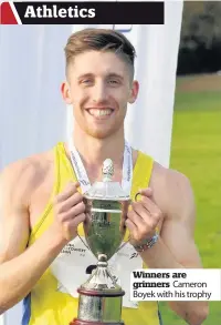  ??  ?? Winners are grinners Cameron Boyek with his trophy