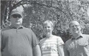  ?? BRAE SHEA/JOURNAL PIONEER ?? James Gaudet, left, was hired by Jenny and Ken Meister, right, owners of Holman's Ice Cream, in 2018 through the At Work project from Notre Dame Place.