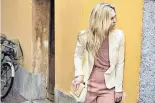  ??  ?? Pink jumpsuit ‘This was from Reiss – so we did include some high street. I love a jumpsuit and so does Julia. It’s elegant yet contempora­ry and youthful – and perfect for action scenes,’ says Emma Fryer