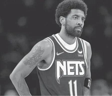  ?? BRAD PENNER/ USA TODAY SPORTS ?? Kyrie Irving, shown in Monday’s playoff- ending loss to the Celtics, played in just 33 of the Nets’ 86 games this season.