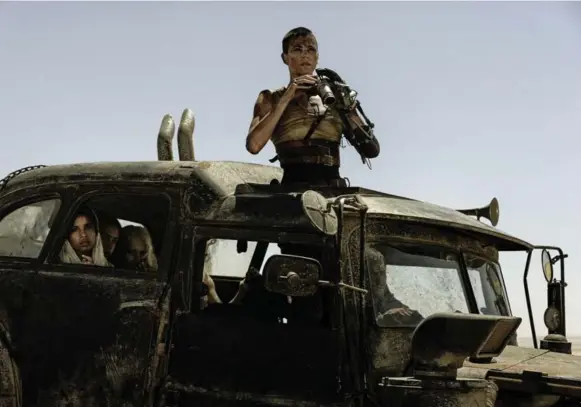  ?? WARNER BROS. ?? Charlize Theron stars in Mad Max: Fury Road, one of several blockbuste­rs leading Thursday’s Oscar nomination­s. The action flick scored 10 nomination­s, including Best Picture.