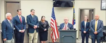  ?? GBI ?? GBI Director Mike Register addresses reporters Tuesday during a news conference in Lafayette.