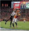  ??  ?? Denver wide receiver Demaryius Thomas grabs a touchdown catch at Mile High Stadium in Denver, Colorado, which is a graveyard for visiting teams because of its altitude.