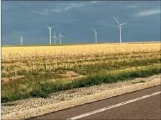  ?? COURTESY DAVE MARSTON ?? Clouds over a windmill farm outside Oakley, Kan.