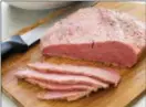  ?? PHOTOS COURTESY OF AMERICA’S TEST KITCHEN ?? Sure, you could buy a strangely pink corned beef at the supermarke­t for St. Patrick’s Day — or for everyday sandwichma­king. Or you could make your own, using tips from America’s Test Kitchen.