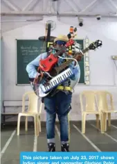  ?? — AFP ?? This picture taken on July 23, 2017 shows Indian singer and songwriter Gladson Peter performing in Mumbai.