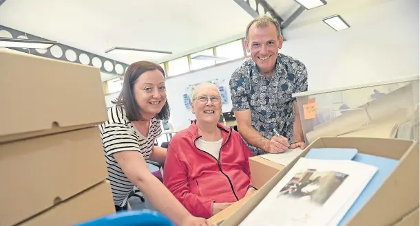  ?? Photograph by Sandy McCook ?? MILESTONE: Archivist Jennifer Johnstone, left, with Highland Hospice’s Cecilia Bottomley and Andrew Leaver at the handover event.