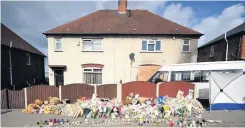  ?? GETTY IMAGES ?? Flowers and tributes outside the house in Victory Road, Derby where six Philpott children died as a result of a deliberate­lyset fire.