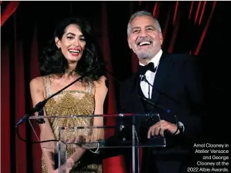  ?? ?? Amal Clooney in Atelier Versace and George Clooney at the 2022 Albie Awards.