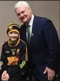  ??  ?? LEFT: Dr. Crokes supporter Amy O’Connor with Uachtarán Chumann Lúthchleas Aogán Ó Fearghail before the AIB GAA Football All-Ireland Senior Club Championsh­ip Final match between Dr. Crokes and Slaughtnei­l at Croke Park in Dublin. Photo by Ray McManus