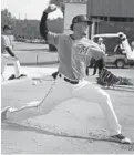  ?? CARLINE JEAN/SUN SENTINEL ?? Elieser Hernandez throws during spring training at Roger Dean Chevrolet Stadium in Jupiter.