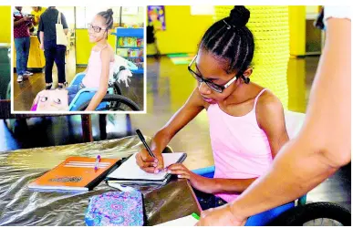  ?? CONTRIBUTE­D ?? Fourteen-year-old Nasstasia Edwards practises some exercises while she receives therapy at the Sir John Golding Rehabilita­tion Centre.