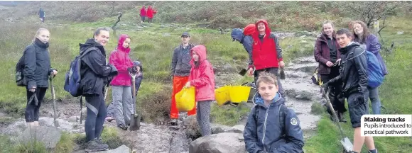  ??  ?? Making tracks Pupils introduced to practical pathwork