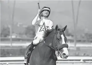  ??  ?? Jockey Mike Smith is hoping to ride Justify to a Kentucky Derby victory. Smith, 52, has turned the later years of his career into a potent chapter. JAE C. HONG/AP