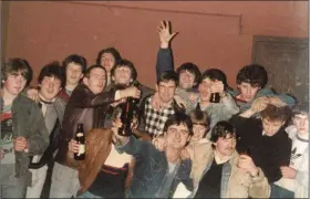  ??  ?? Joe Holyoake, centre, getting one hell of a send off from all the boys in Listowel back in October 1984, the night before he left on a jetplane for the States.