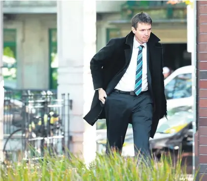  ?? Picture / Nick Reed ?? Colin Craig heads for the chilly surrounds of courtroom 14 at Auckland High Court