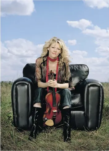  ??  ?? Cape Breton- bred Natalie MacMaster is bringing her fiddle to the Centennial Theatre in North Vancouver on Tuesday, part of a long string of tour dates which has her juggling family and profession­al demands.