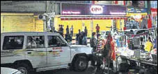  ?? PARVEEN KUMAR/HT PHOTO ?? At least 8 to 10 rounds were fired in the air at Om Sweets in Sector 46. No one was injured, police said.