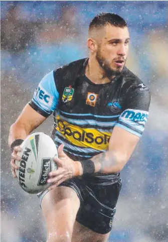  ?? Picture: GETTY IMAGES ?? Jack Bird is at the centre of a war of words between Sharks coach Shane Flanagan (below left) and Broncos boss Wayne Bennett (below right).