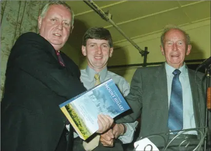  ?? Photo by John Tarrant ?? Oliver Barry (left) launches A View From Mount Hillary in the company of editor Pat Murphy (RIP) and former player John O’Sullivan, the first Banteer player to be selected on a Cork team.