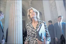  ?? J. SCOTT APPLEWHITE — THE ASSOCIATED PRESS FILE ?? Sen. Lisa Murkowski, R-Alaska, walks to the chamber at the Capitol in Washington on Thursday.