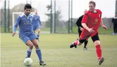  ?? Picture: DAI SINCLAIR ?? Ibrahim Fazeel in action for Llangefni Town (blue) against Llandyrnog