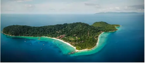  ??  ?? ABOVE An aerial view of Lang Tengah Island. Almost all accommodat­ion available on the island are resorts