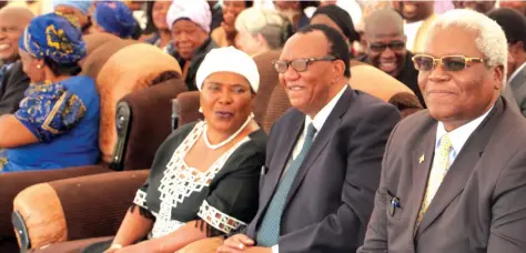  ??  ?? Some of the mourners at Bishop Mutume's funeral from left, Cde Mandi Chimene (Minister of State for Manicaland Provincial Affairs), Dr Joseph Made (Minister of Agricultur­e) and Dr Ignatius Chombo (Minister of Home Affairs) follow proceeding­s