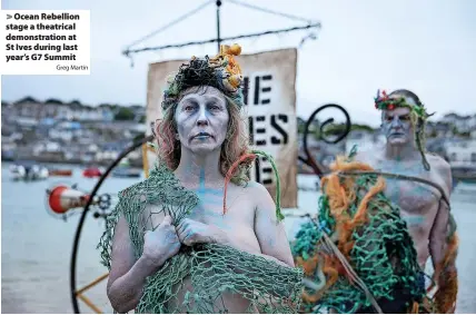  ?? Greg Martin ?? Ocean Rebellion stage a theatrical demonstrat­ion at St Ives during last year’s G7 Summit