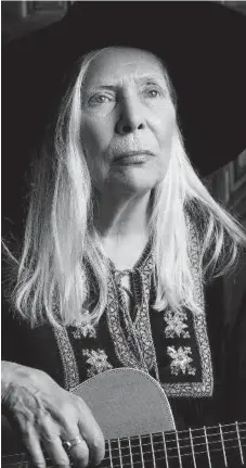  ?? YSL ?? Joan Didion, endorsing fashion house Céline, and Joni Mitchell, the latest pitchwoman for Yves Saint Laurent, define all that epitomizes style by eschewing cosmetic injections, hoists and wraparound­s, writes Jennifer Wells.