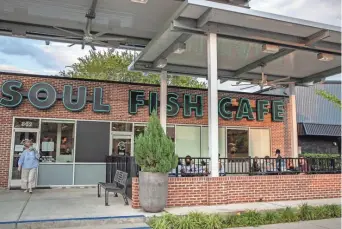  ?? ARIEL COBBERT/ THE COMMERCIAL APPEAL ?? Soul Fish Cafe in Memphis with outdoor seating for diners, one of our picks for top outdoor patios on Saturday, June 14, 2020.