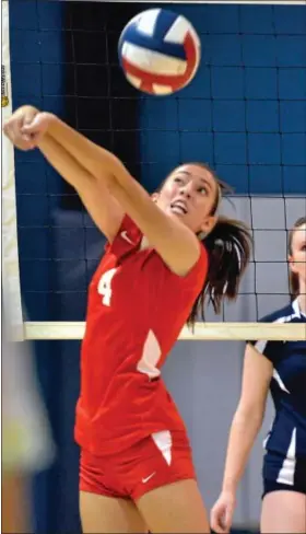  ?? For Montgomery Media / MARK C. PSORAS ?? Souderton’s Jess Overpeck saves a ball as North Penn’s Taylor Maurer looks on during Thursday’s Suburban One Continenta­l Conference action.