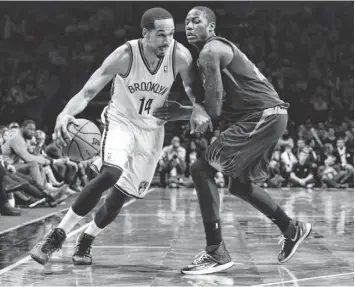  ?? ANTHONY GRUPPUSO, USA TODAY SPORTS ?? The Nets’ Shaun Livingston, left, has put up career highs in minutes and points in a season.