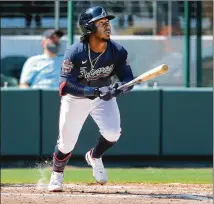  ?? CURTIS COMPTON/CURTIS.COMPTON@AJC.COM ?? Braves second baseman Ozzie Albies, who homered during the March 3 Grapefruit League game against the Baltimore Orioles, showed up at the park Tuesday with stiffness in his neck and was given the day off.