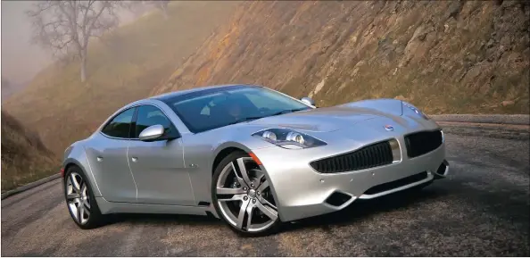  ??  ?? Fisker, whose Karma is pictured here, has been taken over by a Chinese company and may yet re-emerge.