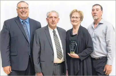  ?? SUBMITTED PHOTO ?? The Boudreau family poses with the Jack Hartery Memorial Lifetime Achievemen­t in Business Award at the Strait Area Chamber of Commerce annual general meeting and awards gala on Wednesday in Port Hawkesbury. From left are Chuck Boudreau, Herman...