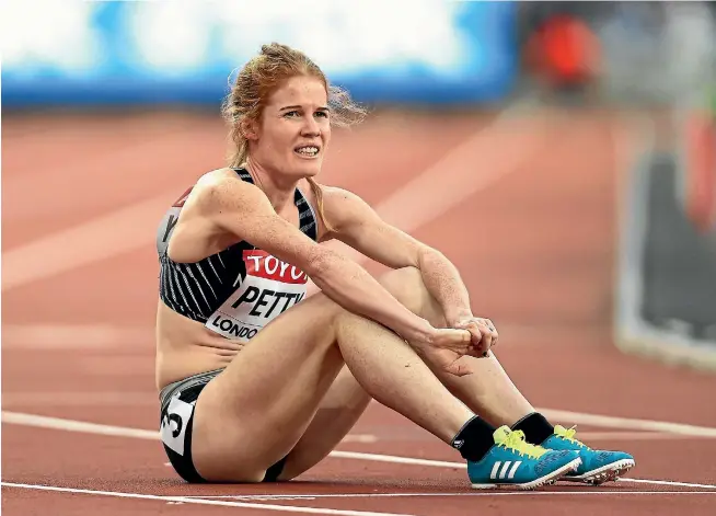  ?? PATRICK SMITH/GETTY IMAGES ?? New Zealand’s Angie Petty contemplat­es what might have been after her 800m heat at the world athletics championsh­ips in London.