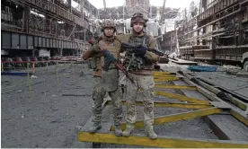  ?? ?? Oleksandr Ivantsov, left, with his company commander, called ‘Onyx’, in the ruins of Azovstal steelworks, Mariupol, April 2022.