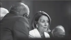  ?? SIPA USA ?? House minority Leader Nancy Pelosi reacts as U.S. President Donald J. Trump delivers his first address to a joint session of Congress from the floor of the House of Representa­tives on Feb. 28 in Washington, D.C.