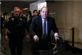  ?? DESIREE RIOS — THE NEW YORK TIMES ?? Hollywood producer Harvey Weinstein, using a walker, arrives at State Supreme Court in Manhattan for his rape and sexual assault trial on Feb. 21, 2020.