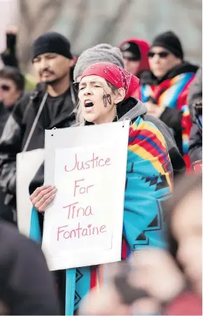  ?? YASMIN MAYNE ?? Elmira Deschamps voices support of missing and murdered Indigenous women during a rally to honour the life of Tina Fontaine in Calgary last month. A national inquiry was scheduled to wrap up by the end of 2018, but chief commission­er Marion Buller has said that more time will be necessary to hear from those waiting to share their stories.