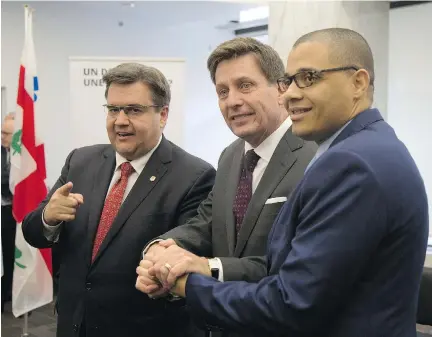  ?? VINCENZO D’ALTO/MONTREAL GAZETTE) ?? Mayor Denis Coderre, Quebec Minister of Public Safety Pierre Moreau and Herman Deparice-Okomba, director for the centre for the prevention of radicaliza­tion leading to violence, at the centre’s official opening in Montreal on Sunday.
