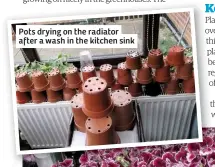  ??  ?? Pots drying on the radiator after a wash in the kitchen sink