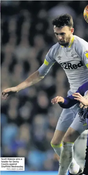  ?? PICS: ANDY CLARKE ?? Scott Malone wins a header for Derby County against Sheffield Wednesday.